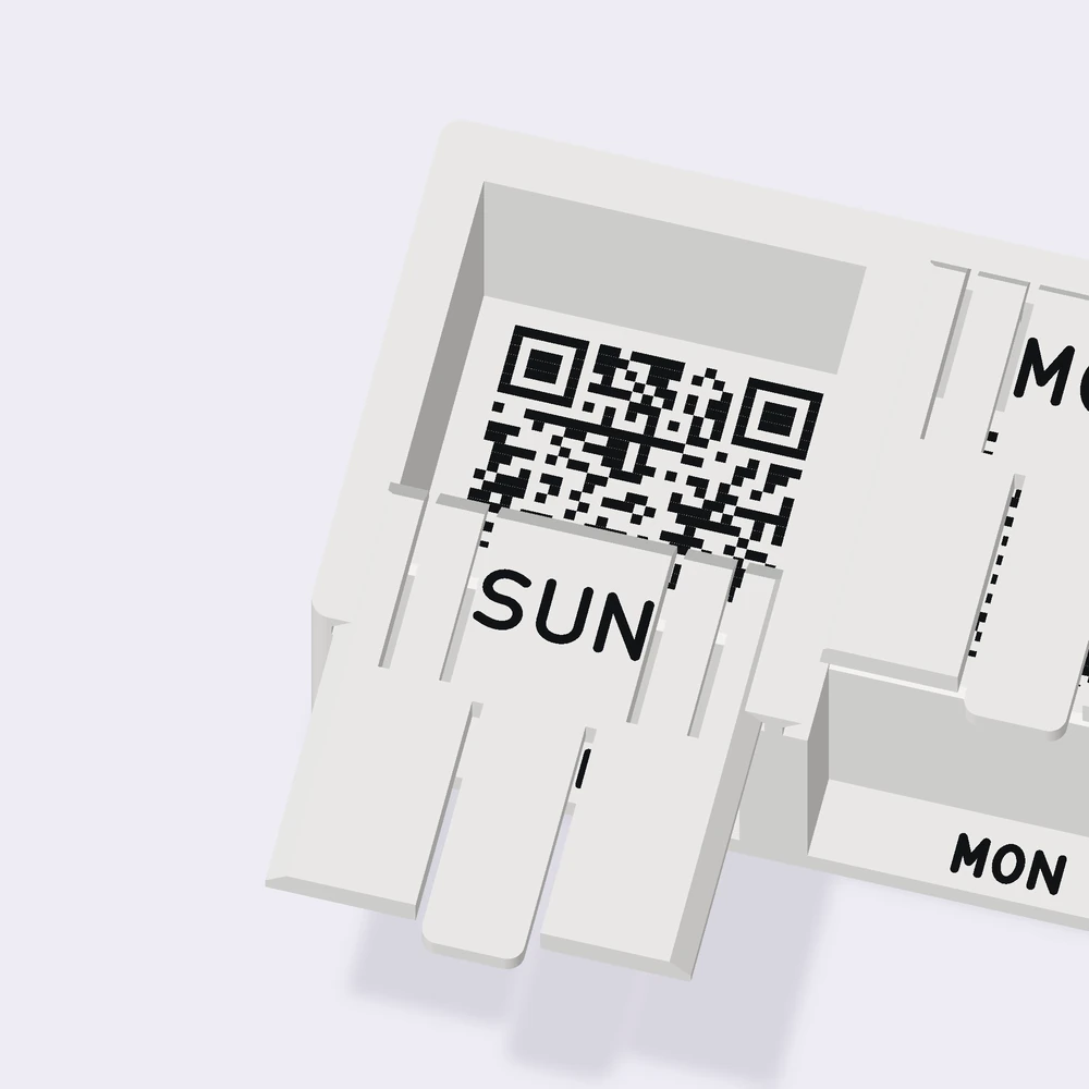 3D render close-up of the Sunday compartment with its lid slid forward to its stop, uncovering a black demo QR code on the compartment floor.